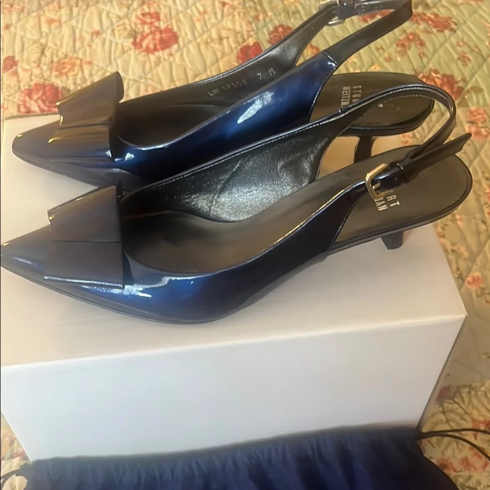 Stuart Weitzman navySlingback Heels
New never worn - Picture 2 of 9